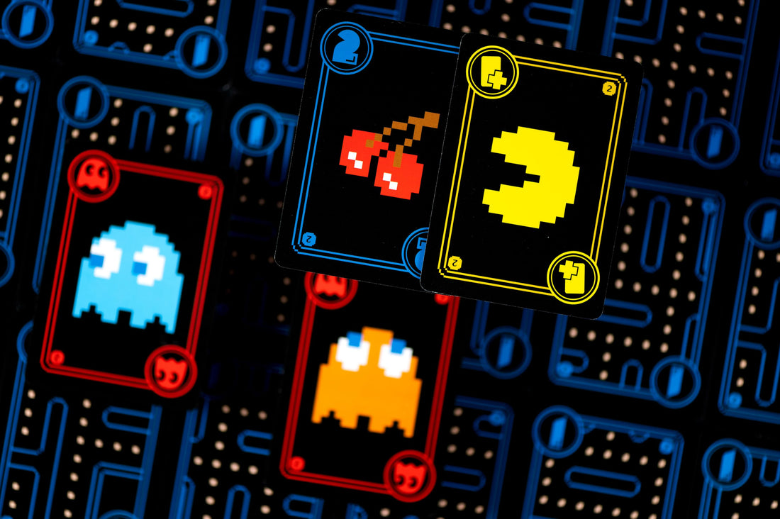 Collect PAC-DOTS and fruit, use power-ups, and avoid the ghosts to win!
